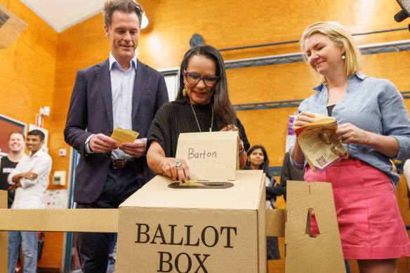 Minister for Indigenous Australians, Linda Burney and Premier Chris Minns with his wife, Anne, cast their vote in the Voice referendum.
