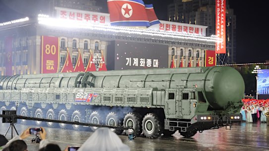 This photo provided by the North Korean government shows what it says is a new intercontinental ballistic missile called the Hwasong-20.