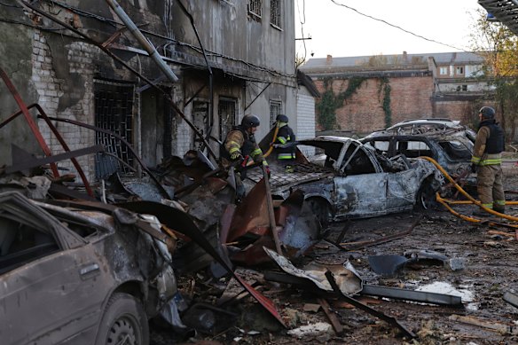Rescuers work at a building destroyed during a Russian strike in Zaporizhzhia, in Ukraine, on Monday.