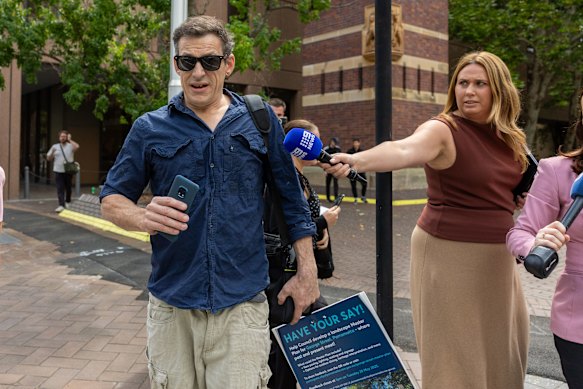 Gregory Williams Tait was confronted by media outside Parramatta Local Court, where he appeared accused of threatening to kill the prime minister just hours after the Bondi terror attack in December.
