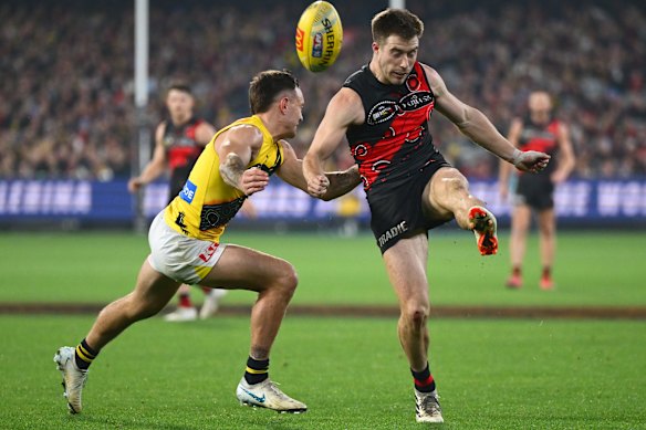 Zach Merrett of the Bombers in action.