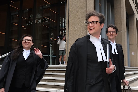 The ACCC’s lead barrister, Michael Hodge, KC, (centre) leaving court with the watchdog’s legal team this week.
