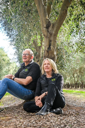 John Symington and woman  Marjan connected  their olive farm.