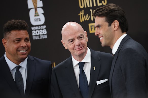 FIFA President Gianni Infantino (centre) with Ronaldo (left) and Kaka on the red carpet ahead of the World Cup draw.
