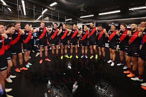 The Bombers sing the song after their hard-fought win.