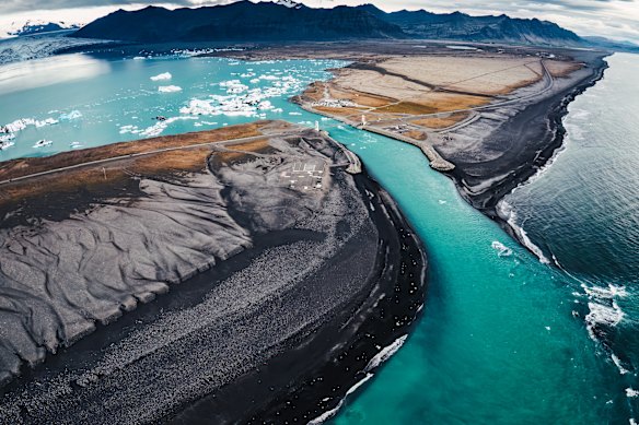 Iceland’s Route 1, also known as the Ring Road, crosses a glacier lake via the Jokulsarlon Bridge.