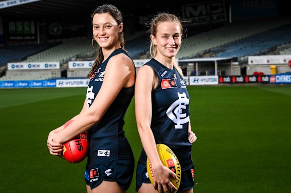 Carlton AFLW player Maddy Hendrie with teammate Yasmin Duursma.