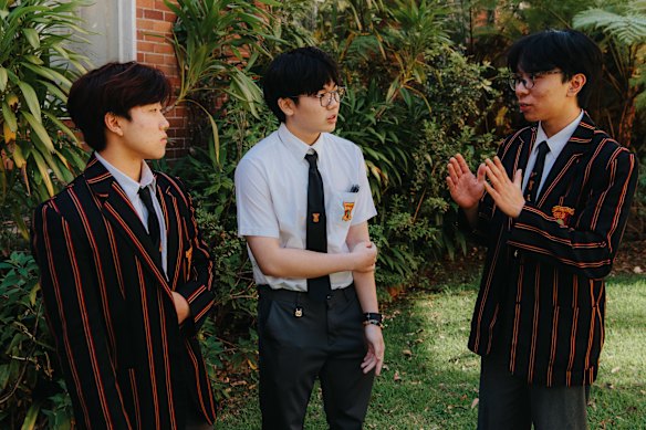 Normanhurst Boys High School students Harry Shin, Ronny Jo and Lam Doan after their English Extension 1 exam on Tuesday.