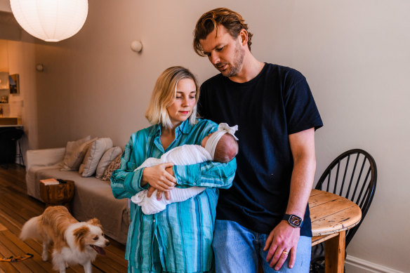 Tom Parish, his wife Kristy and their daughter Kaih. The family cut back on spending and refinanced their home loan as interest rates rise.