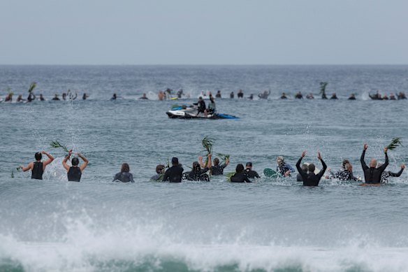 Surfers paddle out in memory of shark attack victim Mercury Psillakis.