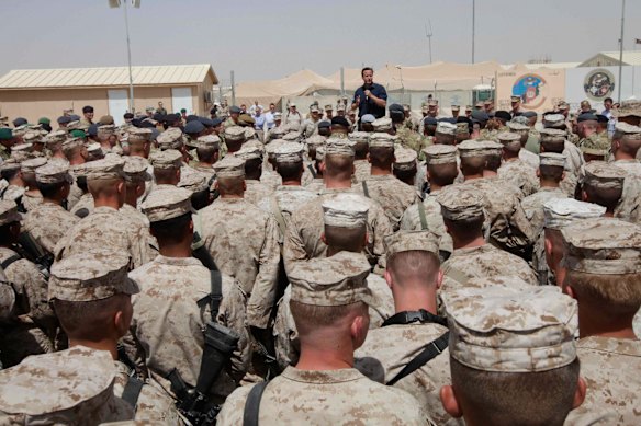 Then British prime minister David Cameron talks to British and US in south Afghanistan in July 2011.