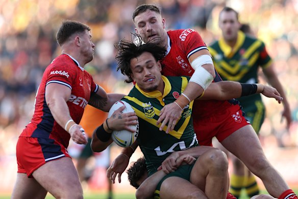 Australia’s Tino Fa’asuamaleaui takes on the English defence in the third Test in Leeds. 