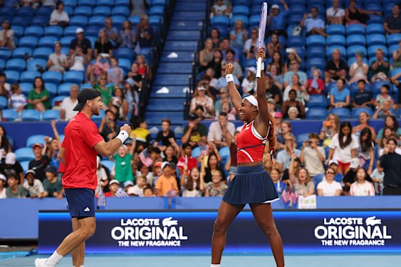 Christian Harrison and Coco Gauff celebrate after winning the mixed doubles match and the quarter-finals against Maria Sakkari and Stefanos Tsitsipas of Team Greece.