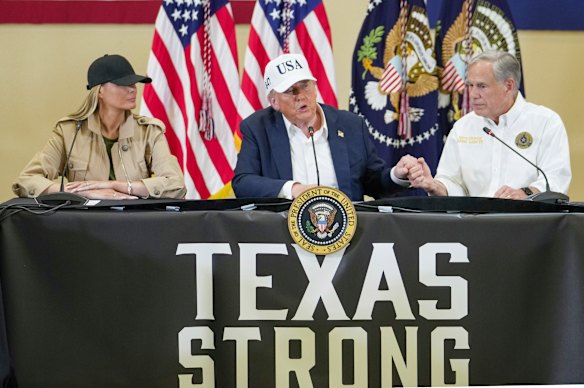 President Donald Trump with wife Melania and Texas Governor Greg Abbott (right) last month after the state’s devastating floods killed more than 130 people.