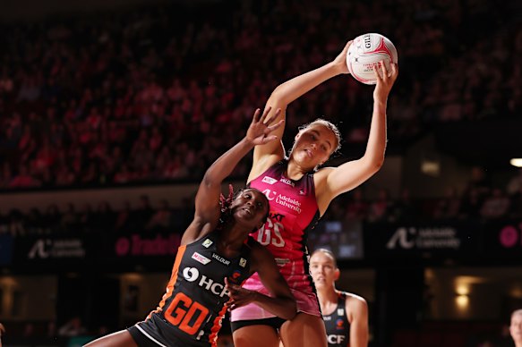 Elmere van der Berg goes high. 