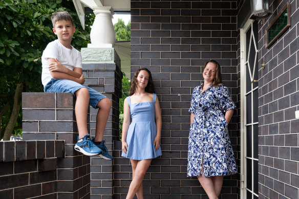 Rachel Crewe with her daughter, Claire, who is in year 8 at Rosebank, and her son, Leo, who is enrolled at the school from year 7.