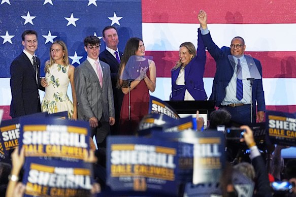 Democrats, including New Jersey governor-elect Mikie Sherrill (second from right), were celebrating days ago. Now they’re at war with each other.