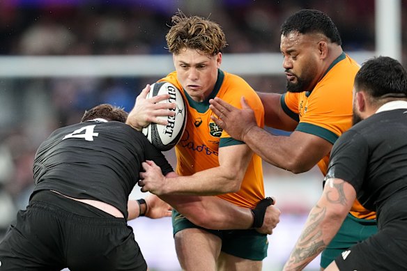 Australia’s James O’Connor runs at the defence.