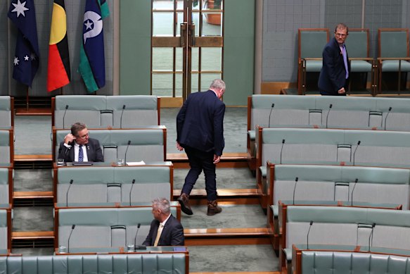 Member for New England Barnaby Joyce leaves the House of Representatives after his statement.