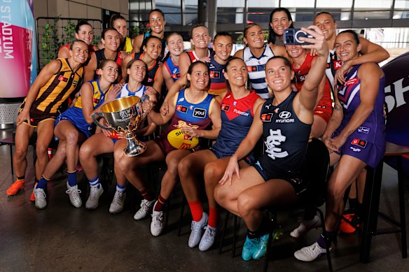 Selfie time: Carlton’s Abbie McKay gets the AFLW group photo organised.