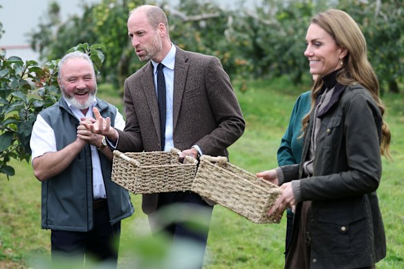 Prince William and Princess Catherine pick apples during a visit to Long Meadow Cider in Northern Ireland this month.