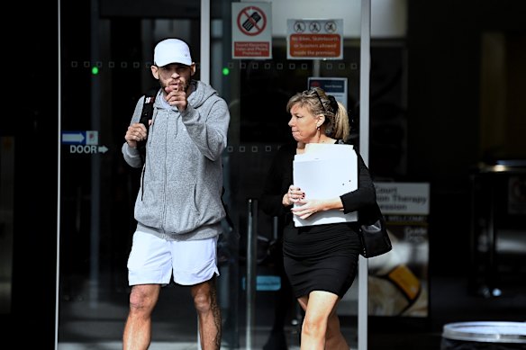 Luke Simpson and Helen Delaney, photographed outside Nowra court where Delaney faced charges of stalking a police officer.
