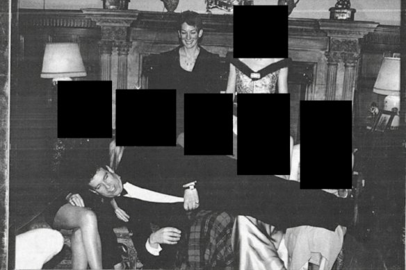 This photograph – redacted and released by the U.S. Department of Justice – shows Andrew laying across several people’s laps with Maxwell standing nearby.