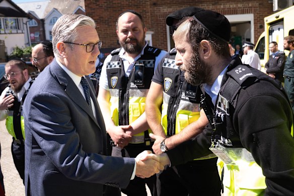 UK Prime Minister Keir Starmer meets first responders.