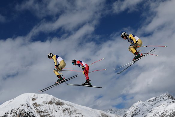 Kevin Drury, Florian Wilmsmann and Tim Hronek participate in Men’s Freestyle Skiing Ski Cross Training at Livigno Air Park in Livigno, Italy.