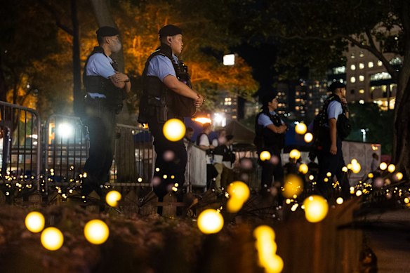 Police officers stand guard at Hong Kong’s Victoria Park, previously the venue for the city’s annual Tiananmen massacre vigil, on the 37th anniversary on Thursday, 