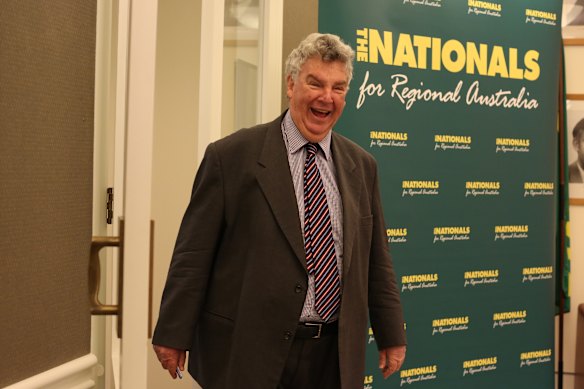Ron Boswell arrives at a National Party meeting at Parliament House in 2013.