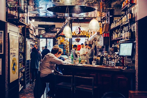 When in Rome… sit among fridge cabinets and wine shelves at Salumeria Roscioli to eat spaghettoni alla carbonara.

