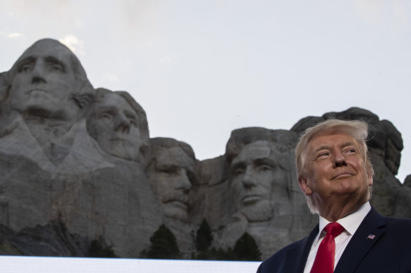 Then president   Donald Trump stands astatine  Mount Rushmore National Memorial, adjacent   Keystone, South Dakota successful  2020.