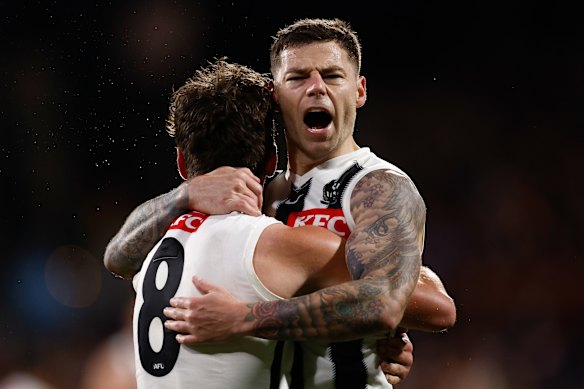 Lachie Schultz (left) and Jamie Elliott celebrate a goal during their qualifying final against the Crows in Adelaide.