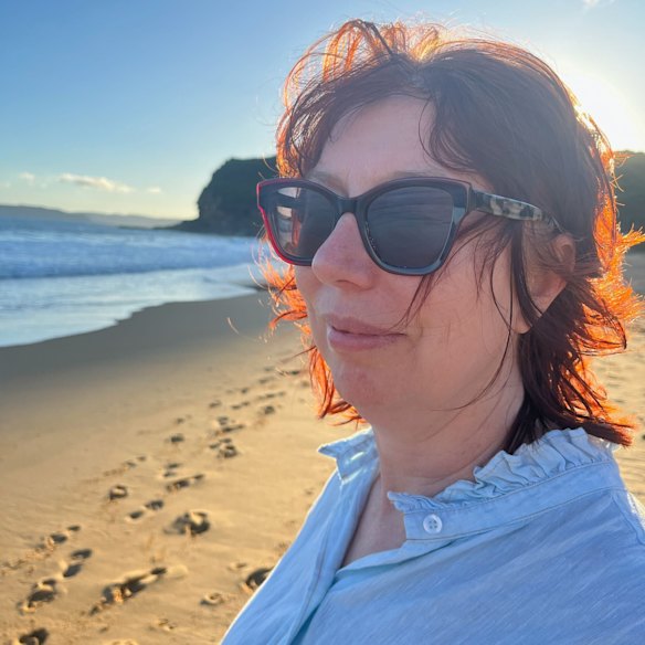 Julie Lewis on Killcare beach. She says some of her most blissfully peaceful moments have been spent in its waters. 