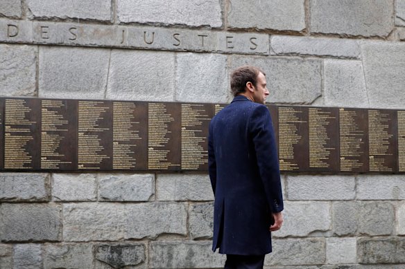 Emmanuel Macron stands at the &ldquo;Mur des Justes&rdquo; at the Shoah Museum in Paris.