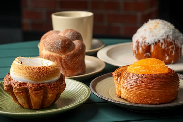  lemon meringue tart, morning bun, bomba Calabrese and a round pastry filled with blood orange cream, lemon financier and mandarin segments