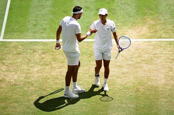 Rinky Hijikata (right) and David Pel didn’t know each other two weeks ago, but are one win from the Wimbledon title.