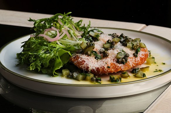 St Ali’ s panko-crumbed chicken schnitzel with caper-y brown butter, parmesan and salad.