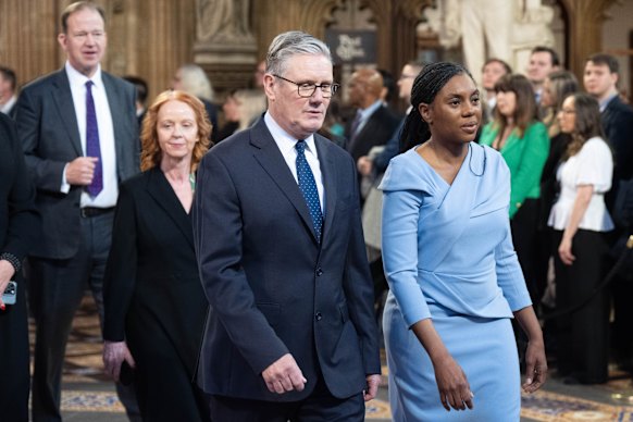Britain’s Prime minister, Keir Starmer and leader of the Conservative Party, Kemi Badenoch return to the House of Commons after listening to the King’s Speech.