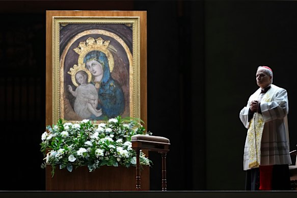  Cardinal Robert Prevost leads the recitation of the Holy Rosary for Pope Francis’ health in St Peter’s Square at the Vatican in March.