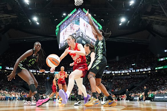 Caitlin Clark plays in front of a massive crowd in the WNBA.