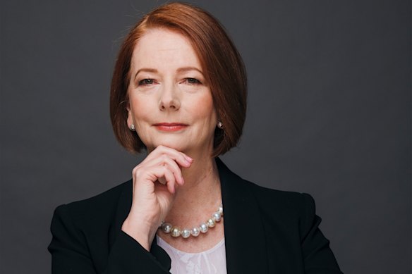 Julia Gillard says the first woman in a job carries an additional burden.