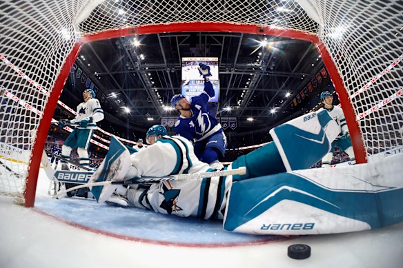 Anthony Cirelli #71 of the Tampa Bay Lightning scores against Yaroslav Askarov #30 of the San Jose Sharks at 1:49 of the second period at Benchmark International Arena on January 20, 2026 in Tampa, Florida. The Lightning defeated the Sharks 4-1.