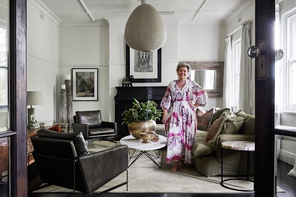 Kelly McCloskey in her upstairs lounge. The sofa is by Maker & Son; the artwork is by Bronwyn Bancroft.