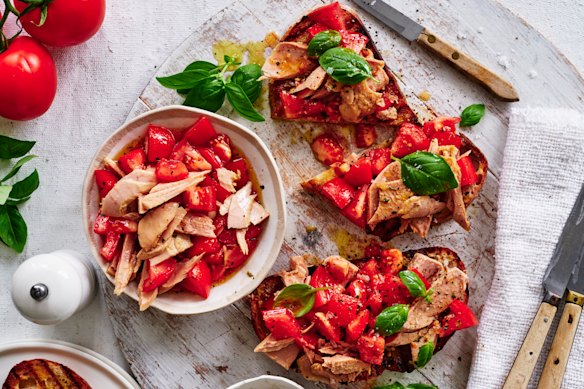 Budget-friendly bruschetta topped with tuna and tomato.
