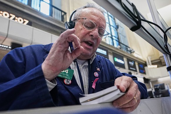Options trader Phil Fracassini works on the floor of the New York Stock Exchange.