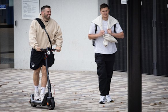 Sydney Roosters captain James Tedesco and playmaker Hugo Savala depart Allianz Stadium after training.