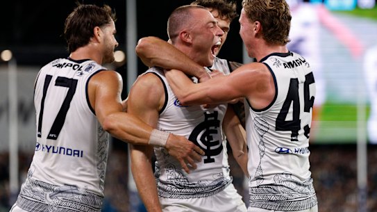 Will Hayward celebrates a goal.