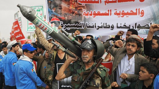 Houthi supporters hold a rally in Sanaa, Yemen, this month against the Saudi-led coalition. The banner in Arabic reads, “All Saudi oil facilities are targets to our missiles and drones”.
